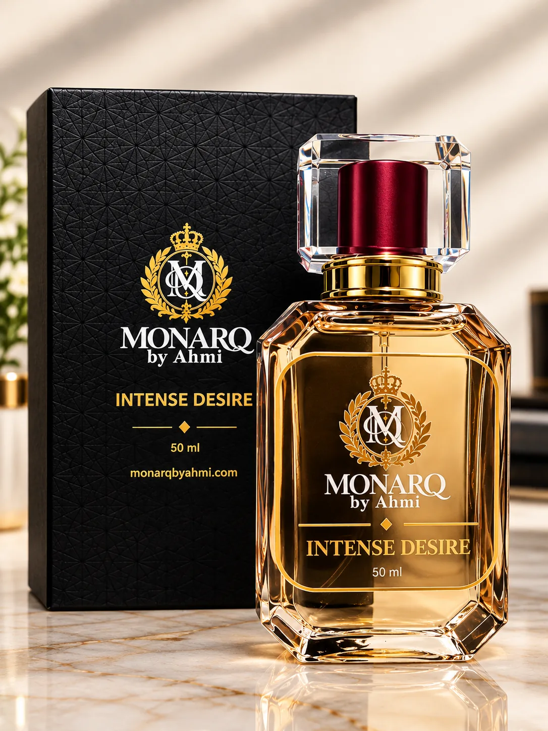 Monarq Intense Desire 50ml amber perfume bottle beside its black gift box