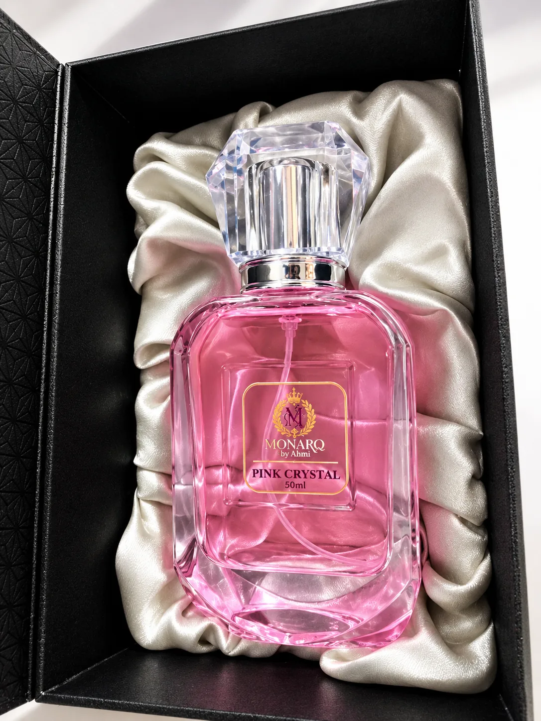 Monarq Pink Crystal 50ml pink perfume bottle in a satin-lined black gift box