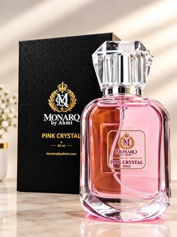 Monarq Pink Crystal 50ml pink perfume bottle beside its black gift box